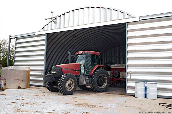 Q-model tractor storage with sliding doors